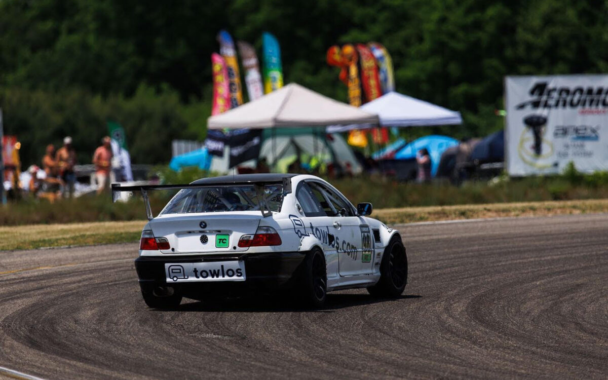 towlos bmw race car going into a turn.